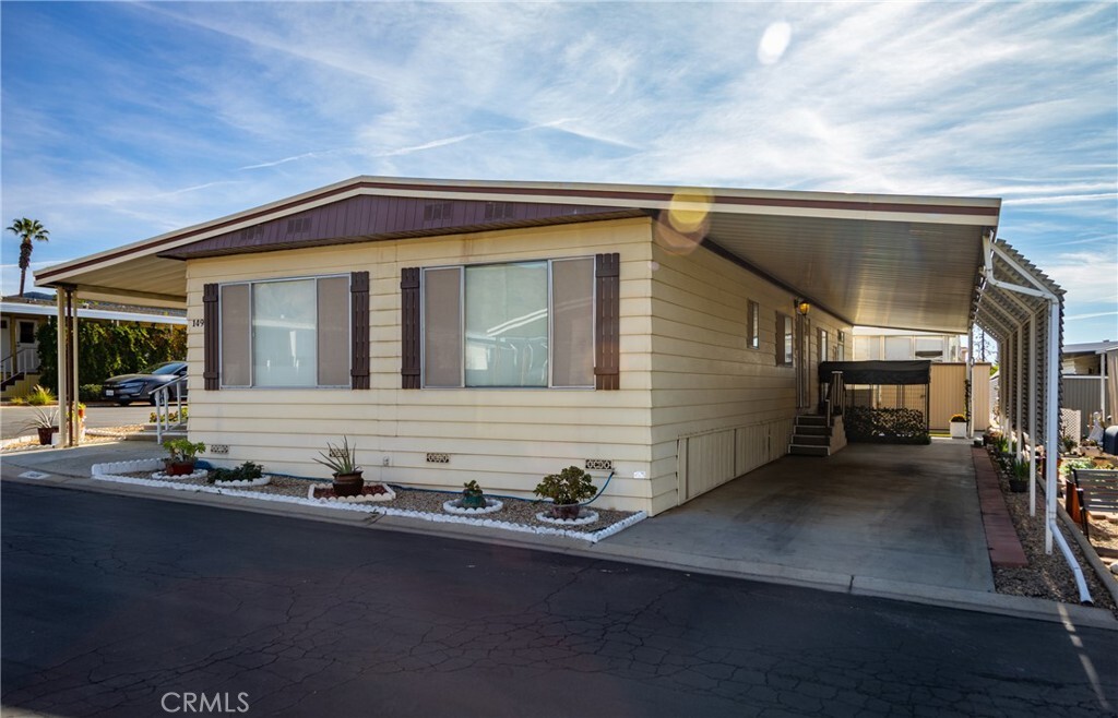 Property Photo: 35218 Fir Ave 149 CA 92399