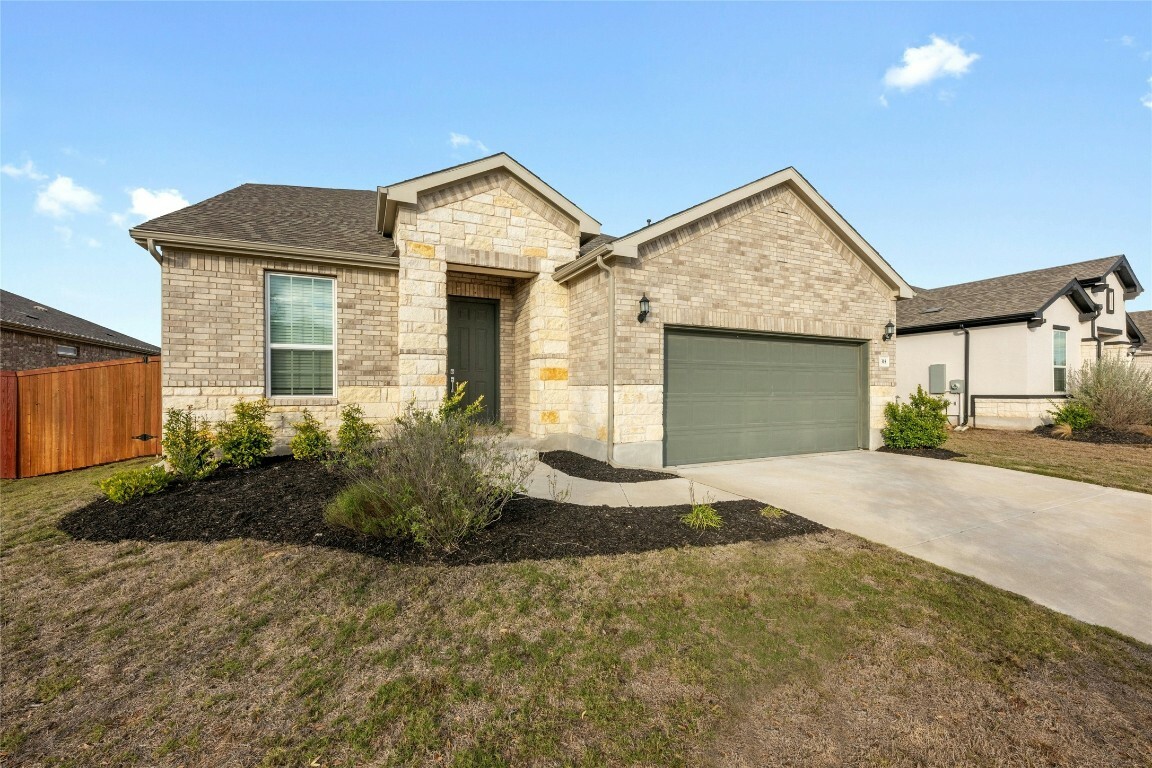 Property Photo:  315 Climbing Rock Loop  TX 78620 