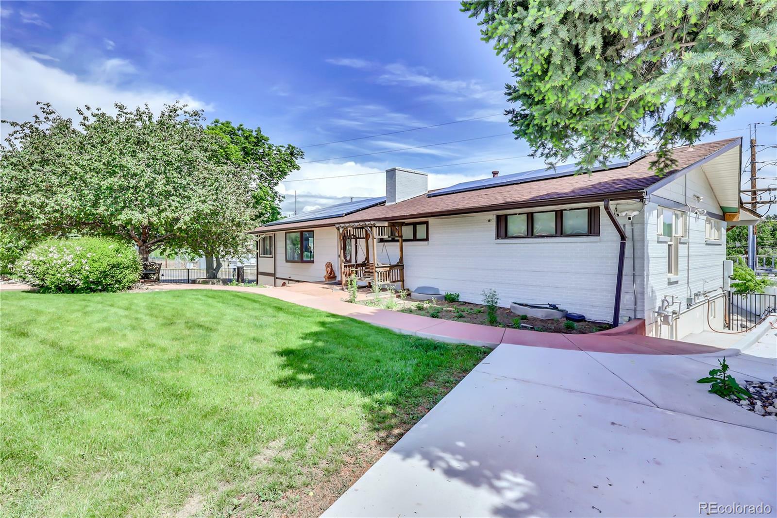 Property Photo: 7475 W Kentucky Avenue CO 80226