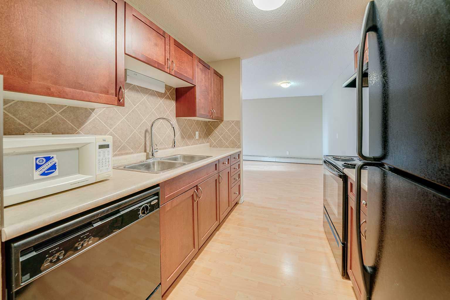 Property Photo:  7164 Parke Avenue 305  AB T4P 1M9 