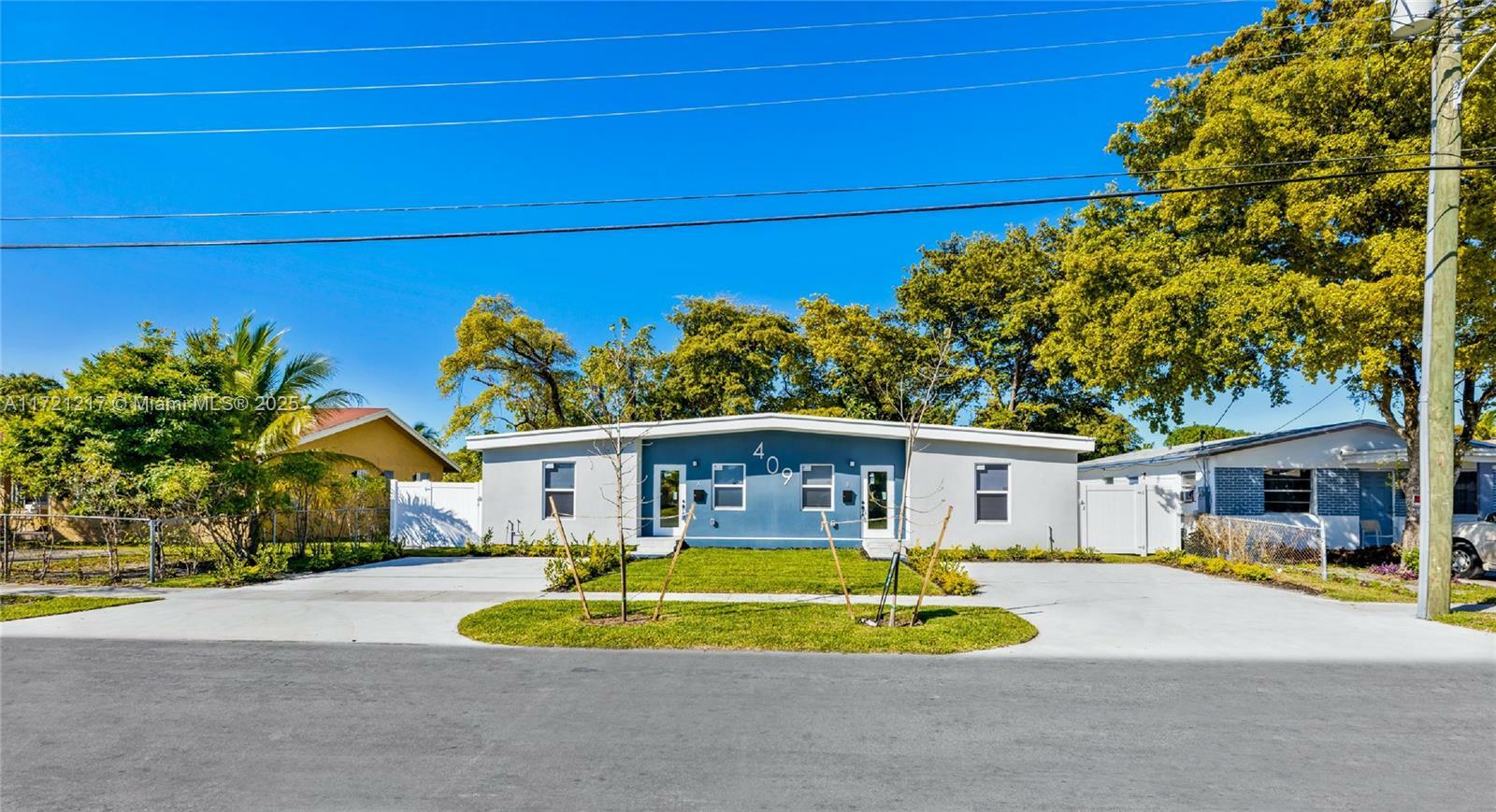 Property Photo:  409 NW 4th Ave  FL 33009 