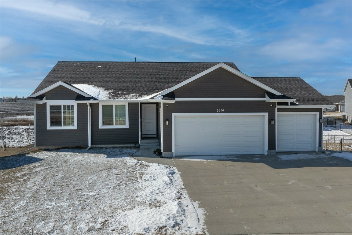 Property Photo:  6614 Scarlet Rose Circle SW  IA 52404 