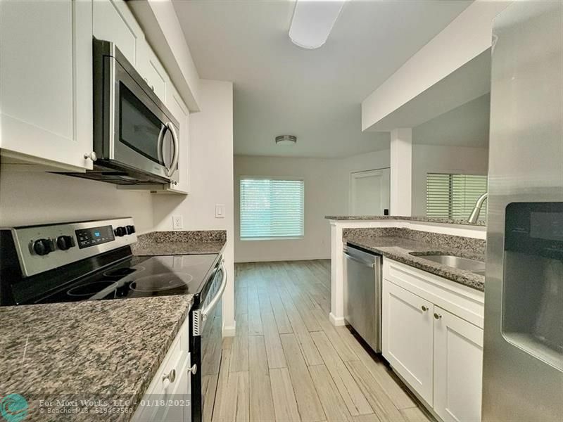 Property Photo:  2425 NW 33rd St 1304  FL 33309 