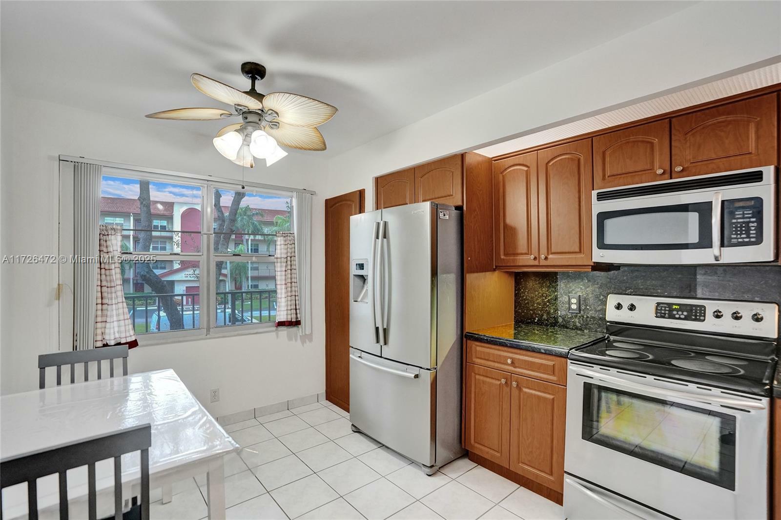 Property Photo:  1001 SW 128th Ter 207B  FL 33027 