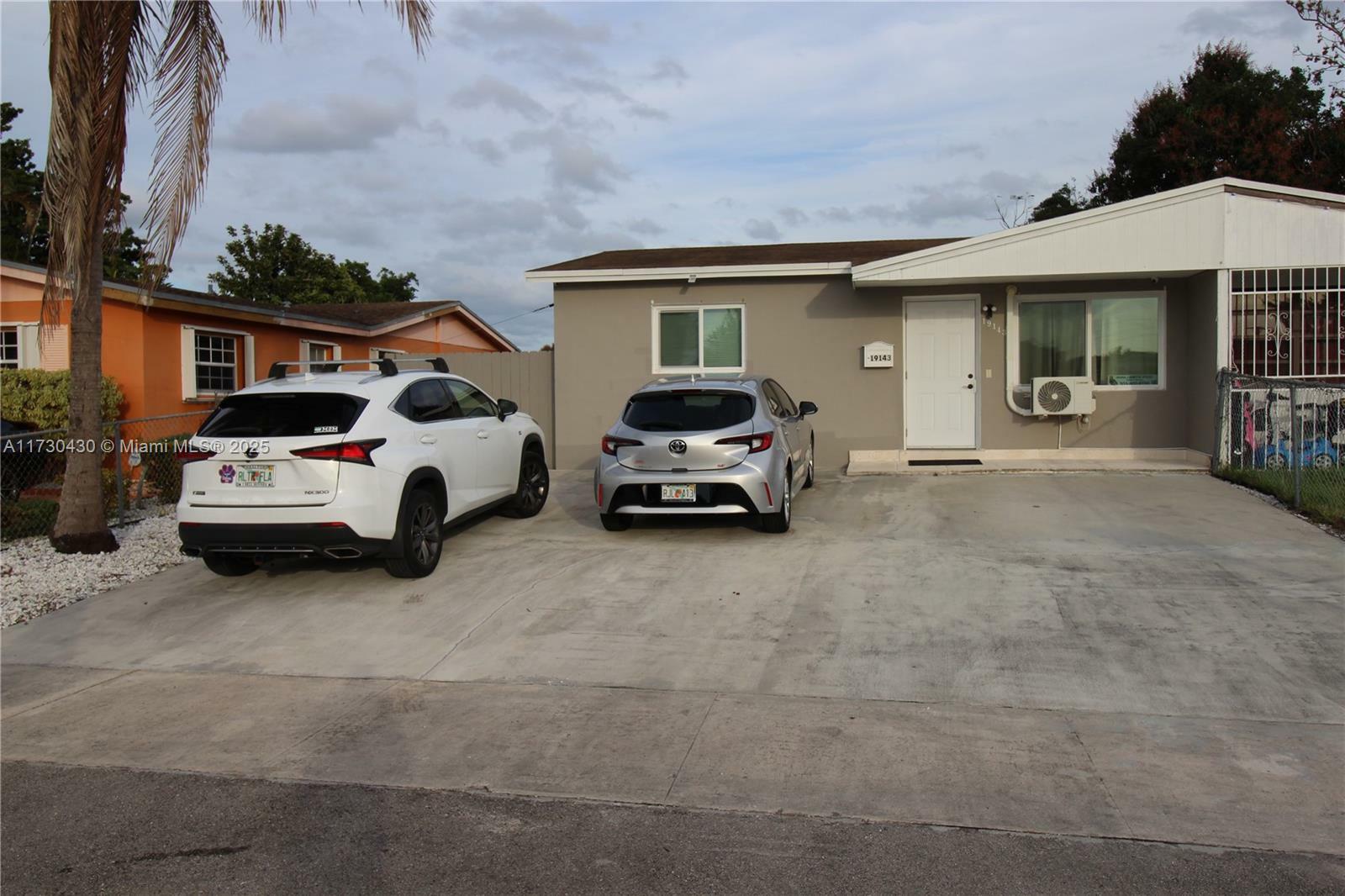 Property Photo:  19143 NW 35th Ave  FL 33056 