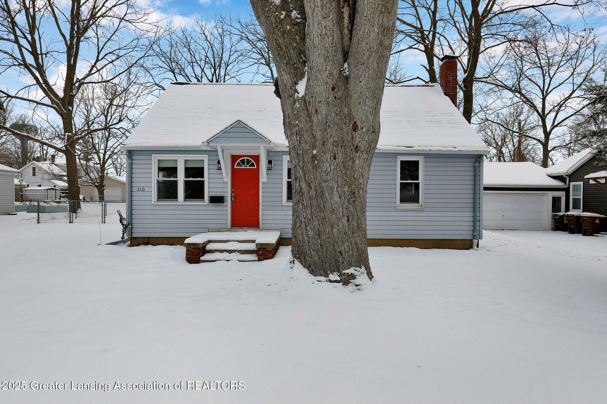 Property Photo:  310 Crossman Street  MI 48895 