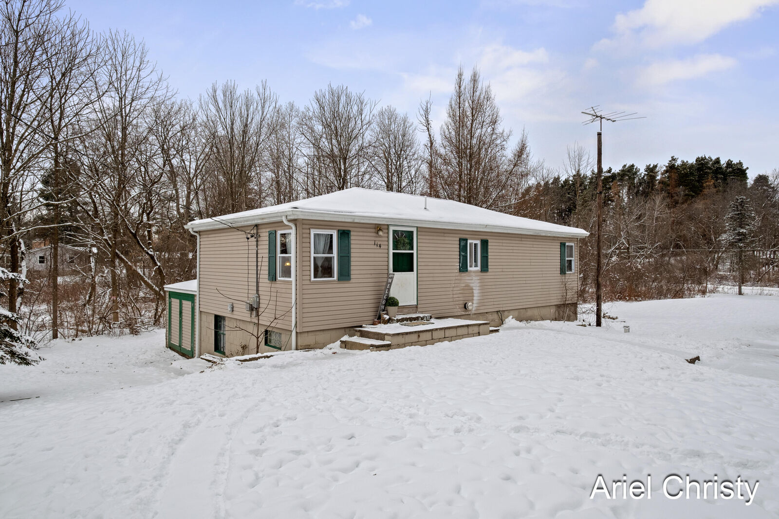 Property Photo:  114 Indian Lakes Road NE  MI 49345