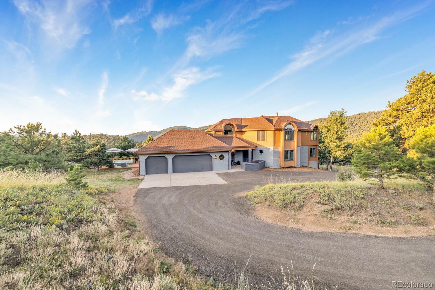 Property Photo: 22196 Boar Head Road CO 80454