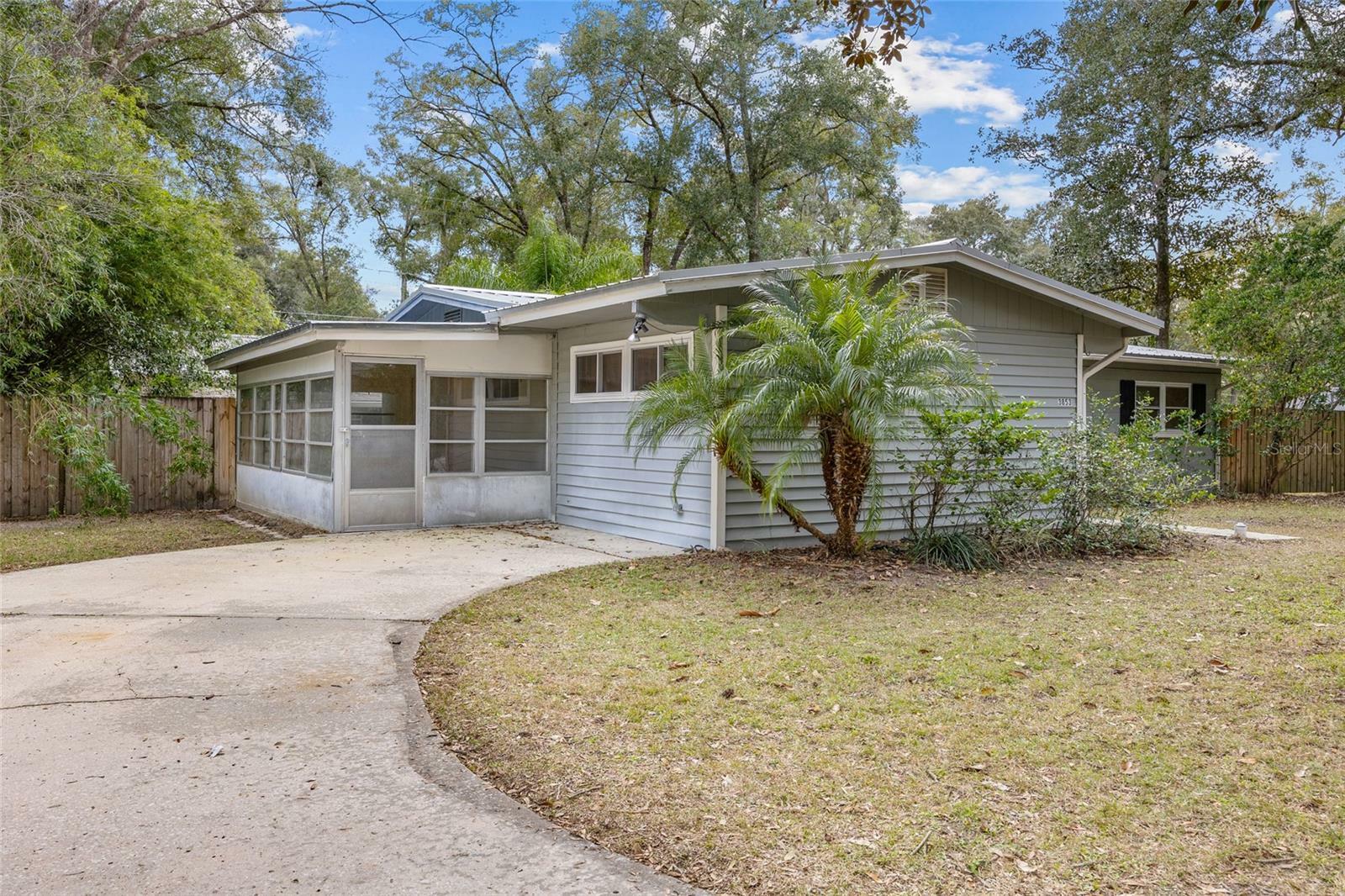 Property Photo:  3853 NW 13th Place  FL 32605 