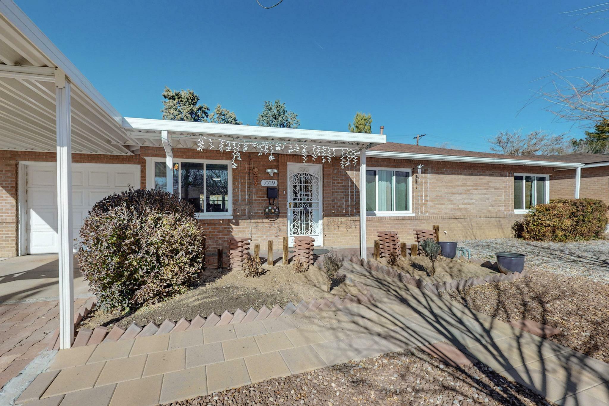 Property Photo:  7719 Euclid Avenue NE  NM 87110 