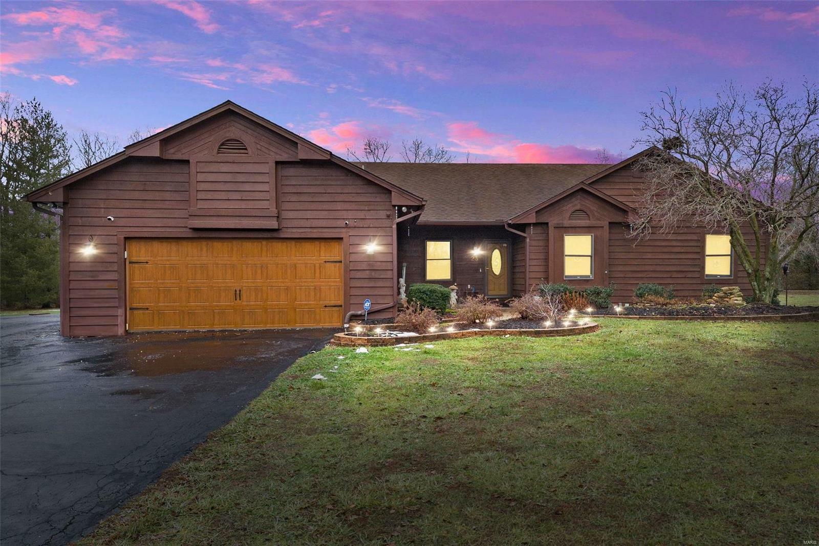 Property Photo:  23 Falling Leaf Drive  MO 63367 