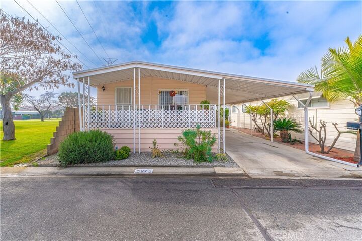 Property Photo:  8509 Beverly Boulevard 37  CA 90660 