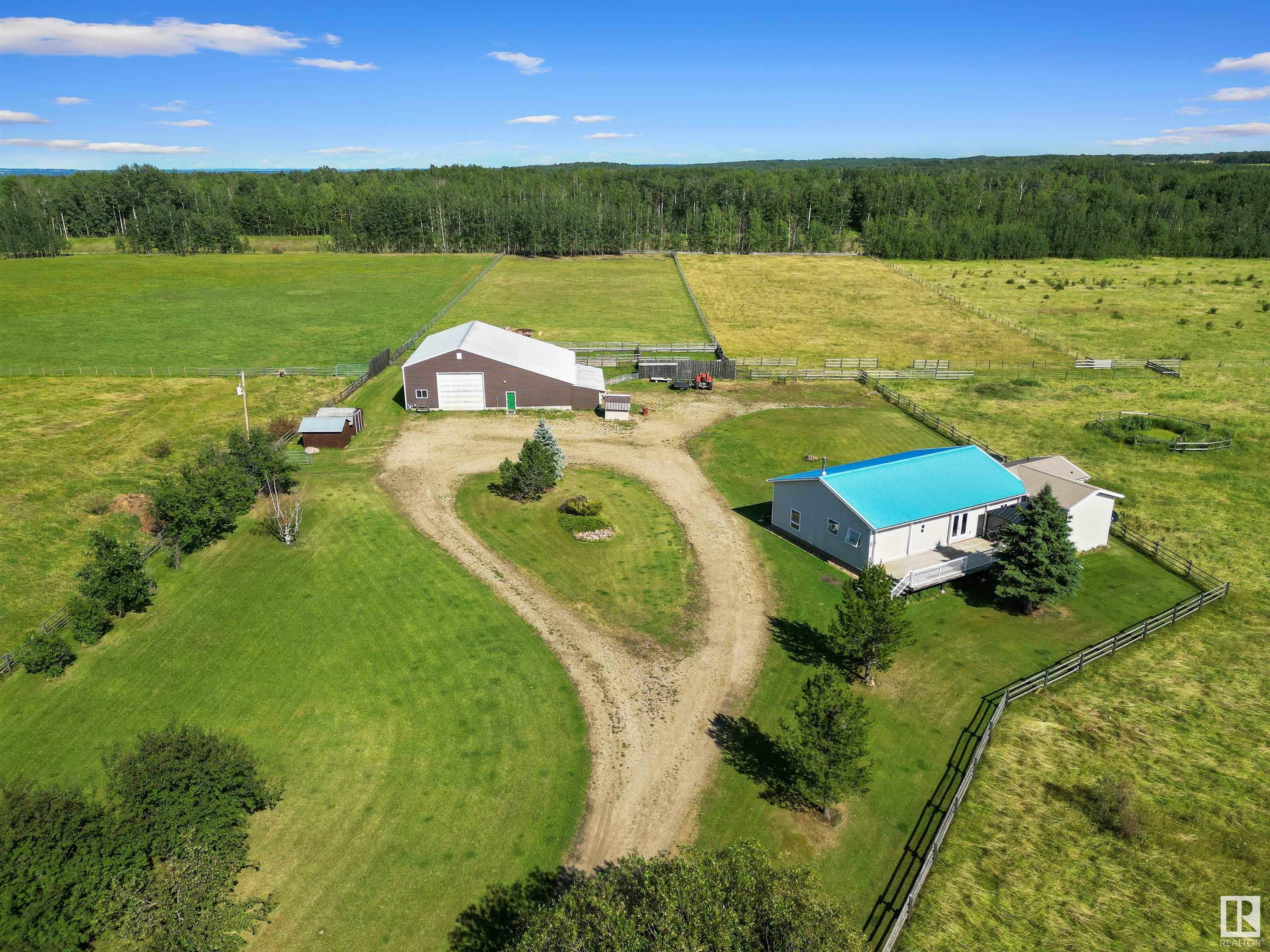 Property Photo:  452057 Rge Rd 70A  AB T0C 0A0 