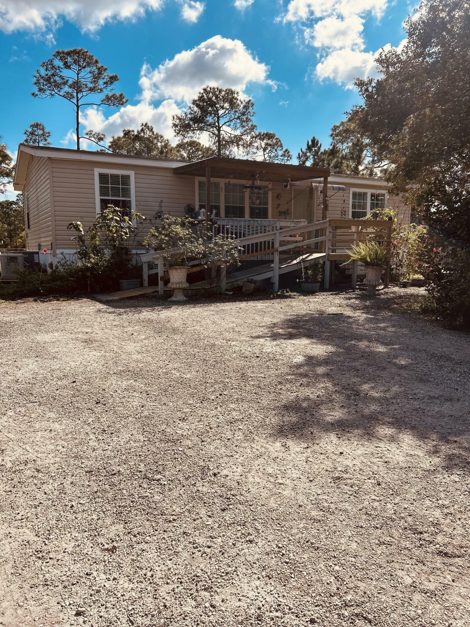 Property Photo:  745 S Trebol Street  FL 33440 