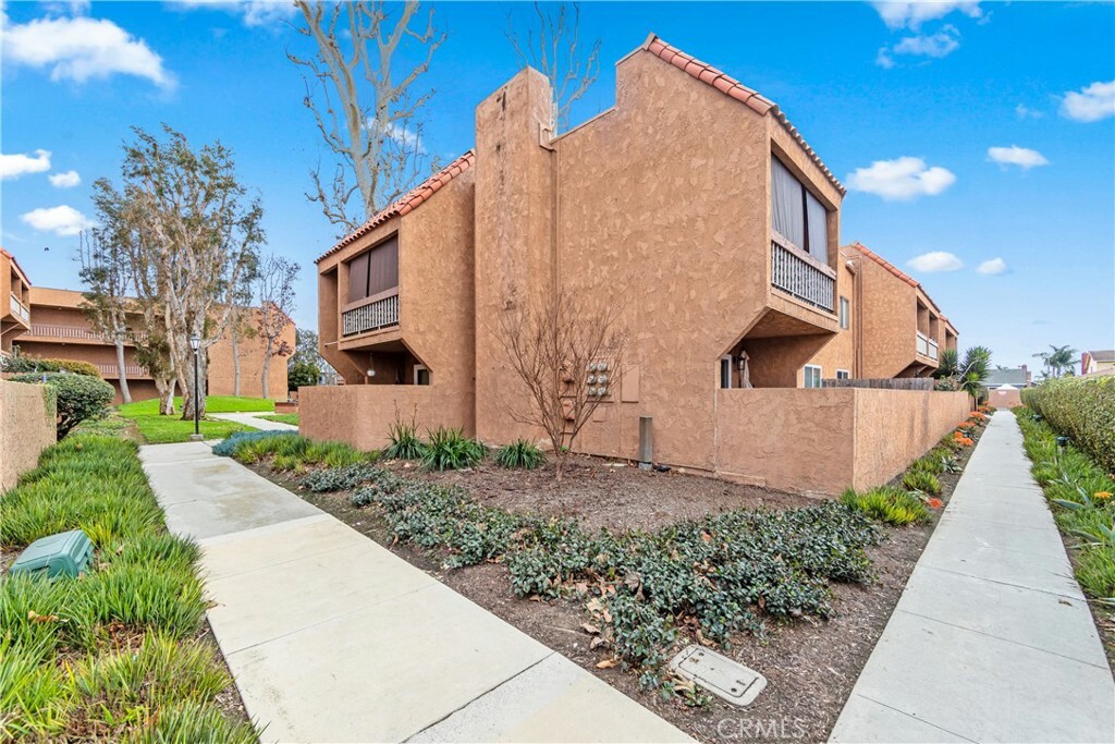 Property Photo:  6600 Warner Avenue 118  CA 92647 