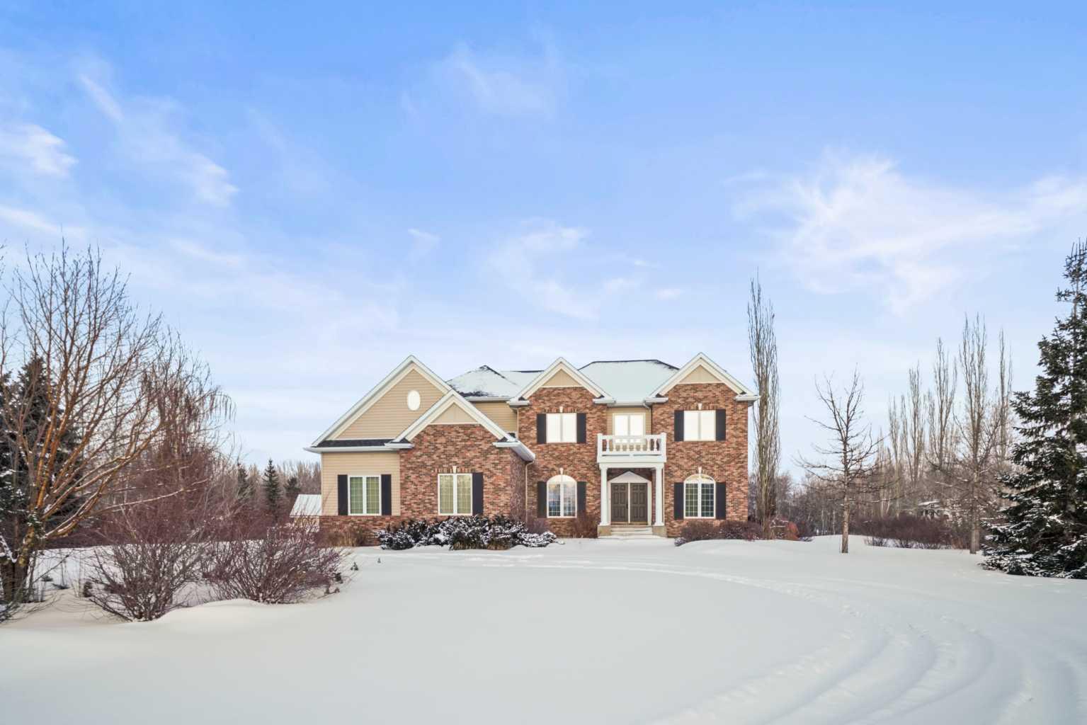 Property Photo: 37411 Waskasoo Avenue 105 AB T4S 1Y2