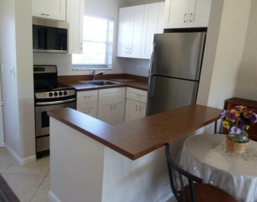 Property Photo:  2800 W Golf Boulevard 123  FL 33064 