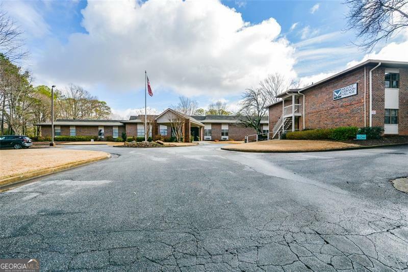 Property Photo:  475 Mount Vernon Highway NE A-102  GA 30328 