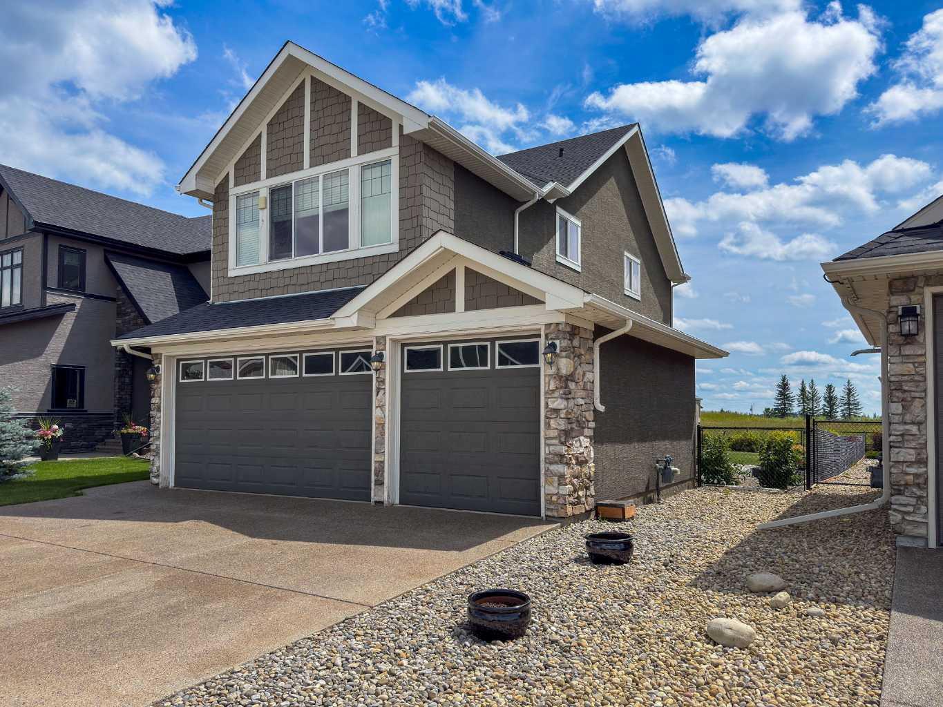 Property Photo: 580 Muirfield Crescent AB T0J 1Y1