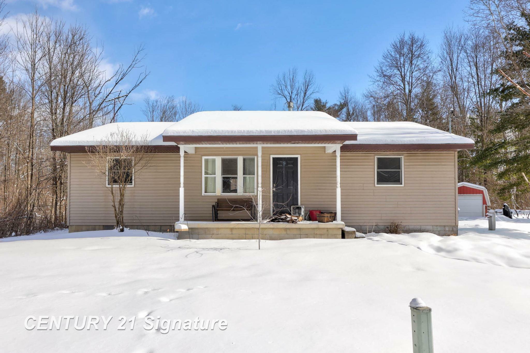 Property Photo:  4909 Caine Road  MI 48768 