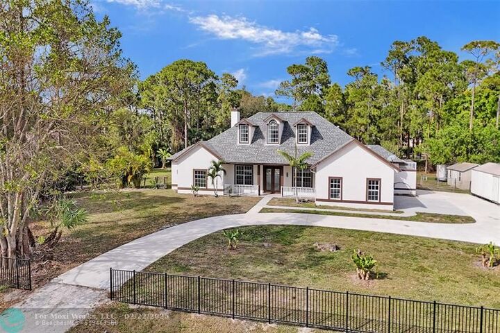 Property Photo:  16153 72nd Rd N  FL 33470 