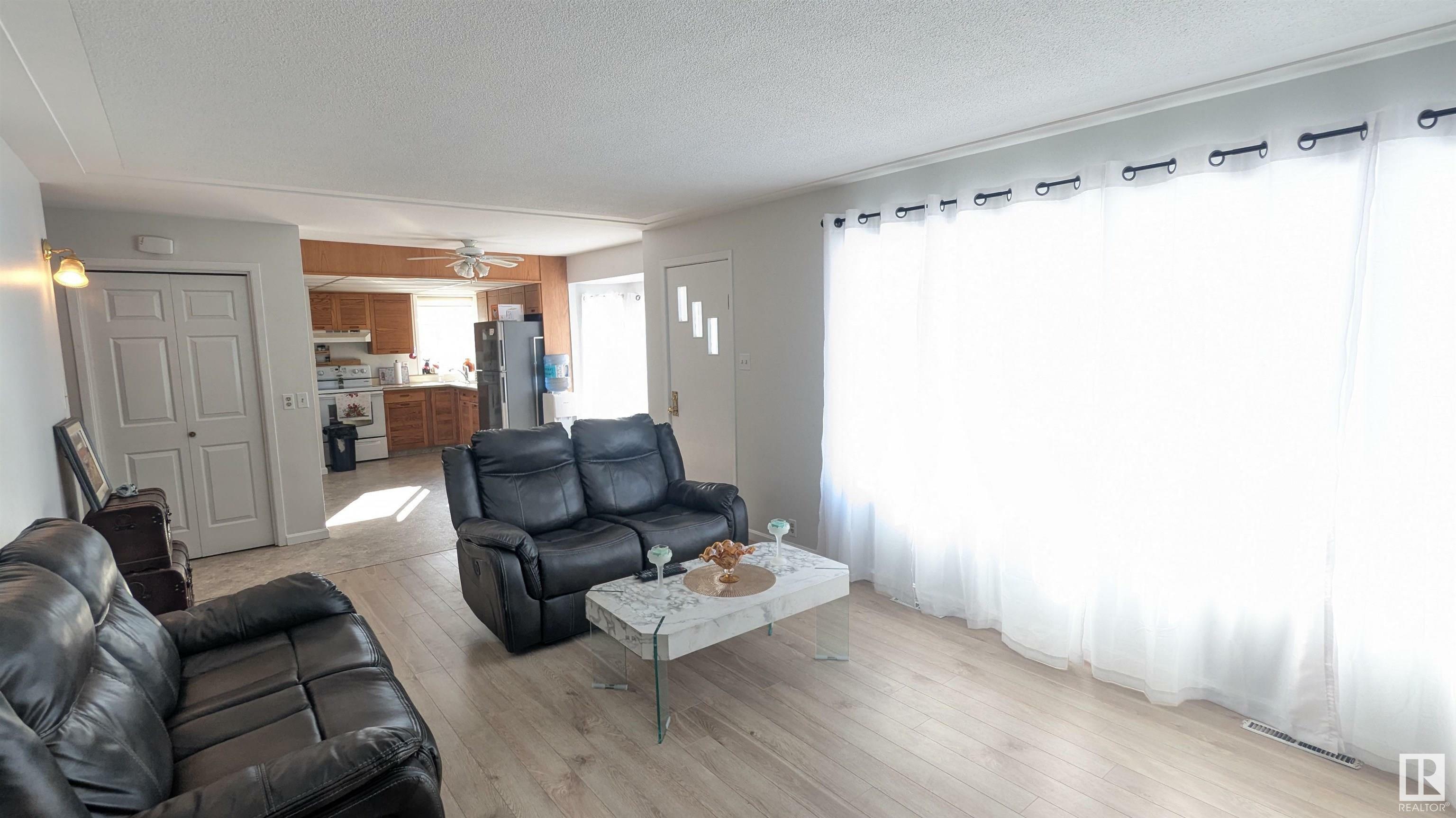 Property Photo: 5014 45B Avenue AB T9C 1L6