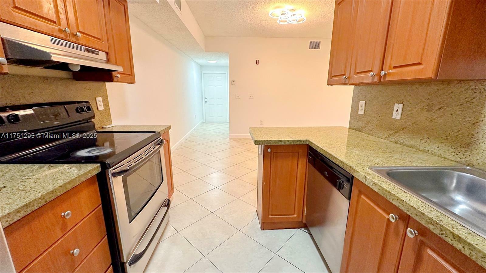 Property Photo:  3261 Sabal Palm Mnr 104  FL 33024 