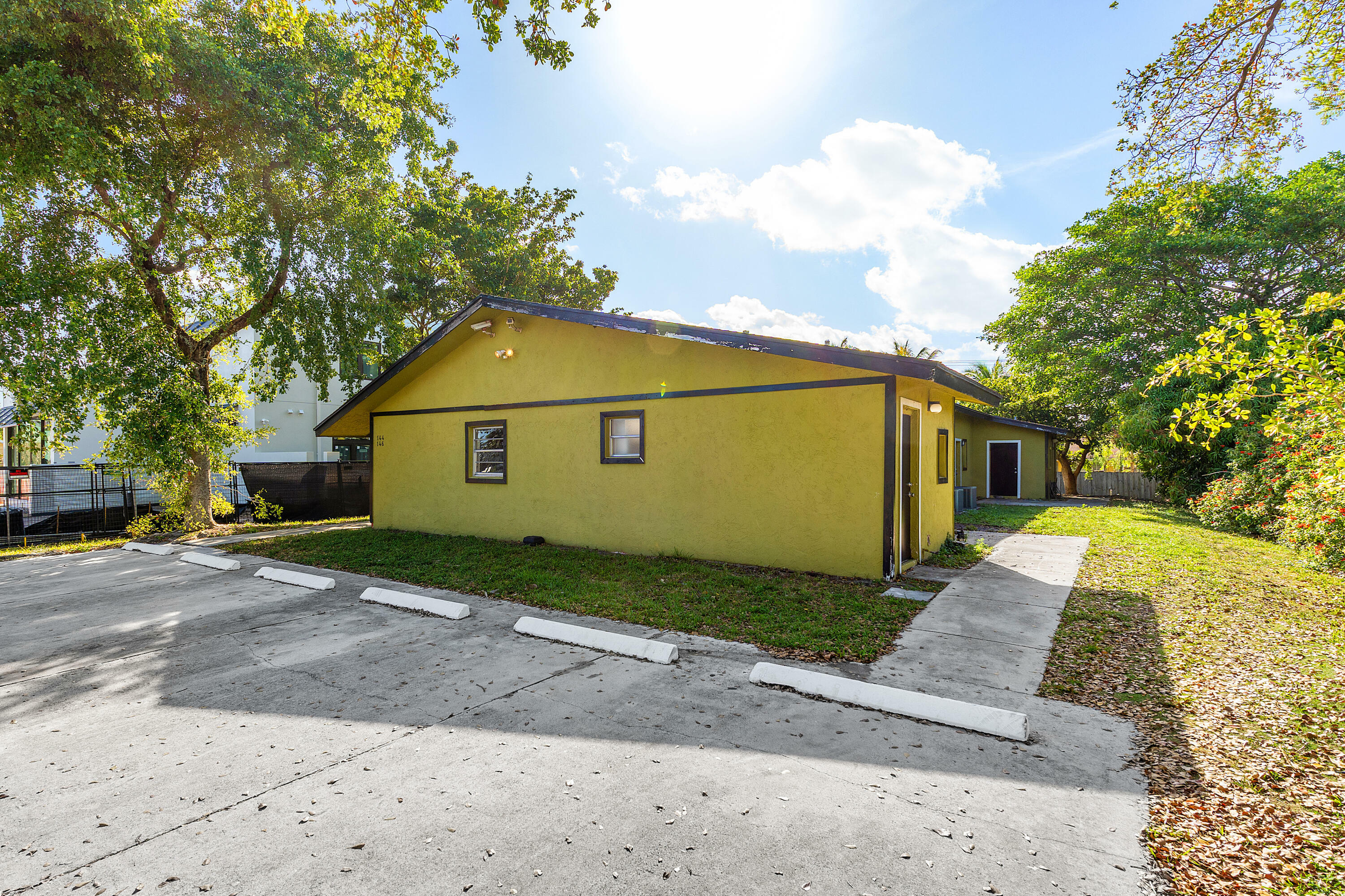 Property Photo:  144 SW 2nd Avenue  FL 33444 