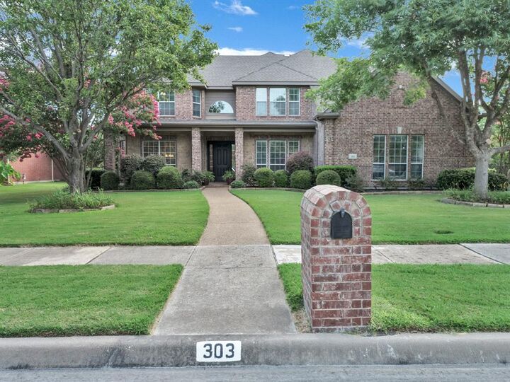 303 Normandy Lane  Heath TX 75032 photo