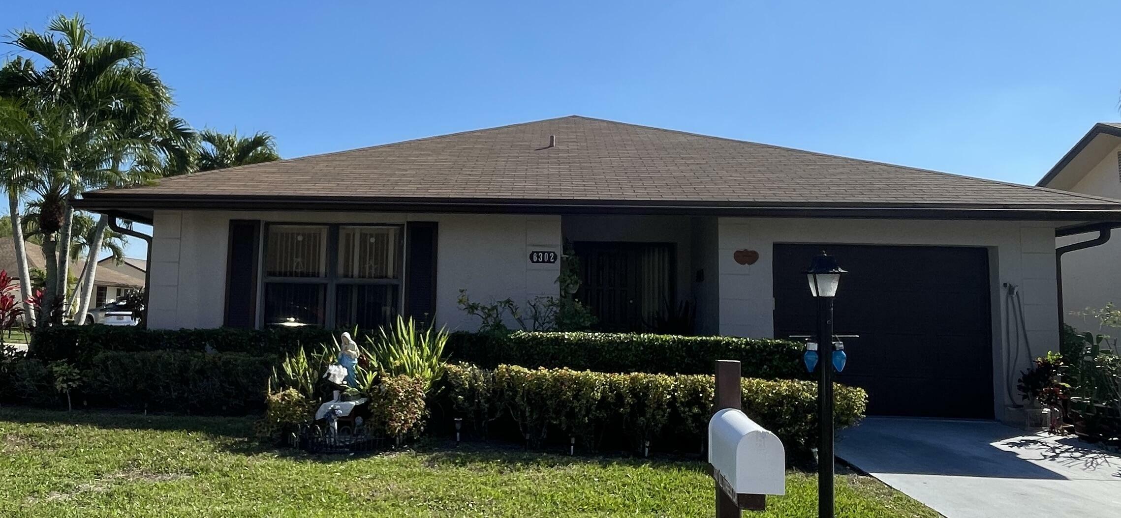 Property Photo: 6302 Tall Cypress Circle FL 33463