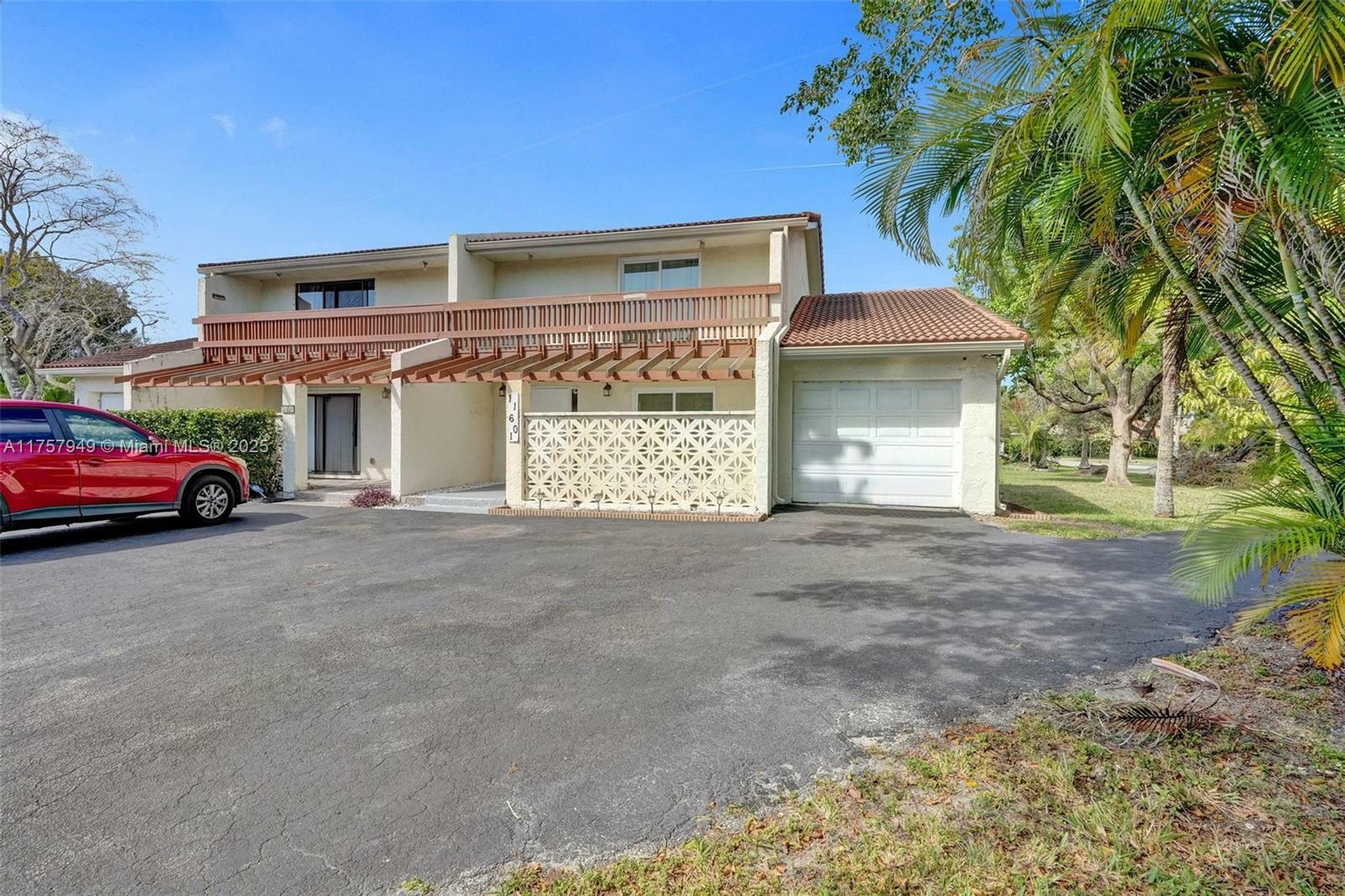 Property Photo:  11601 NW 29th Ct 2E  FL 33065 