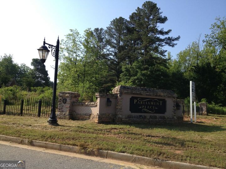 Property Photo:  1002 Queens Bridge Way  GA 30223 