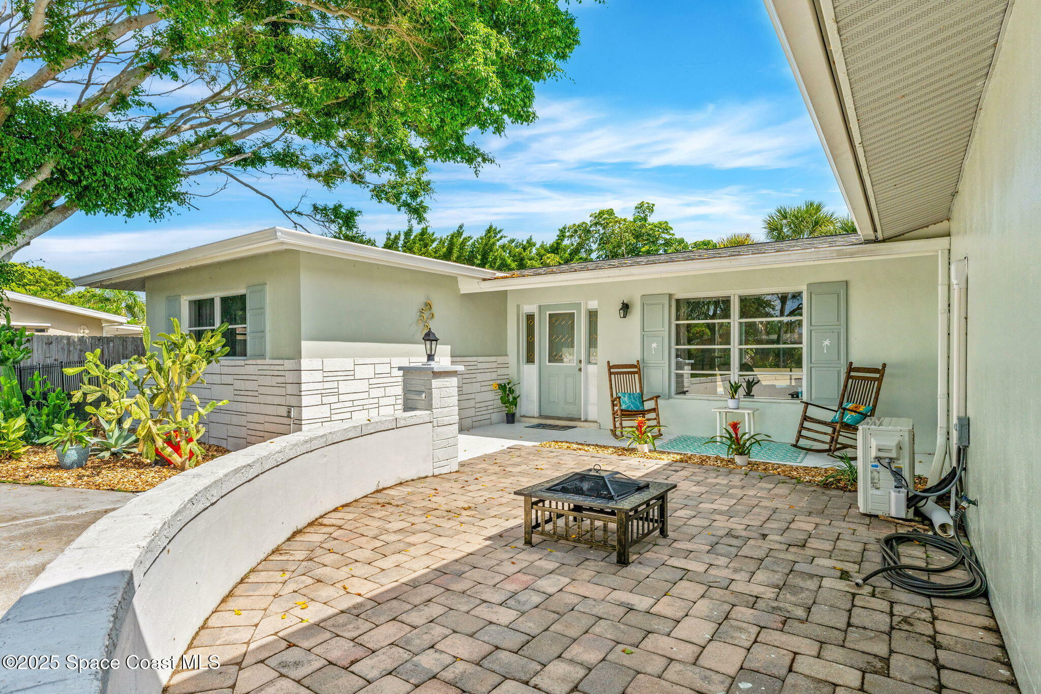 Property Photo: 303 Surf Road FL 32951