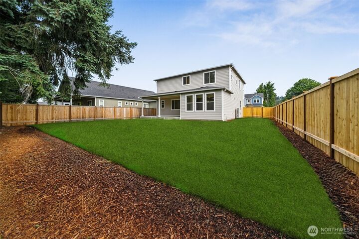 Property Photo: 11826 63rd St Court E 01 WA 98372