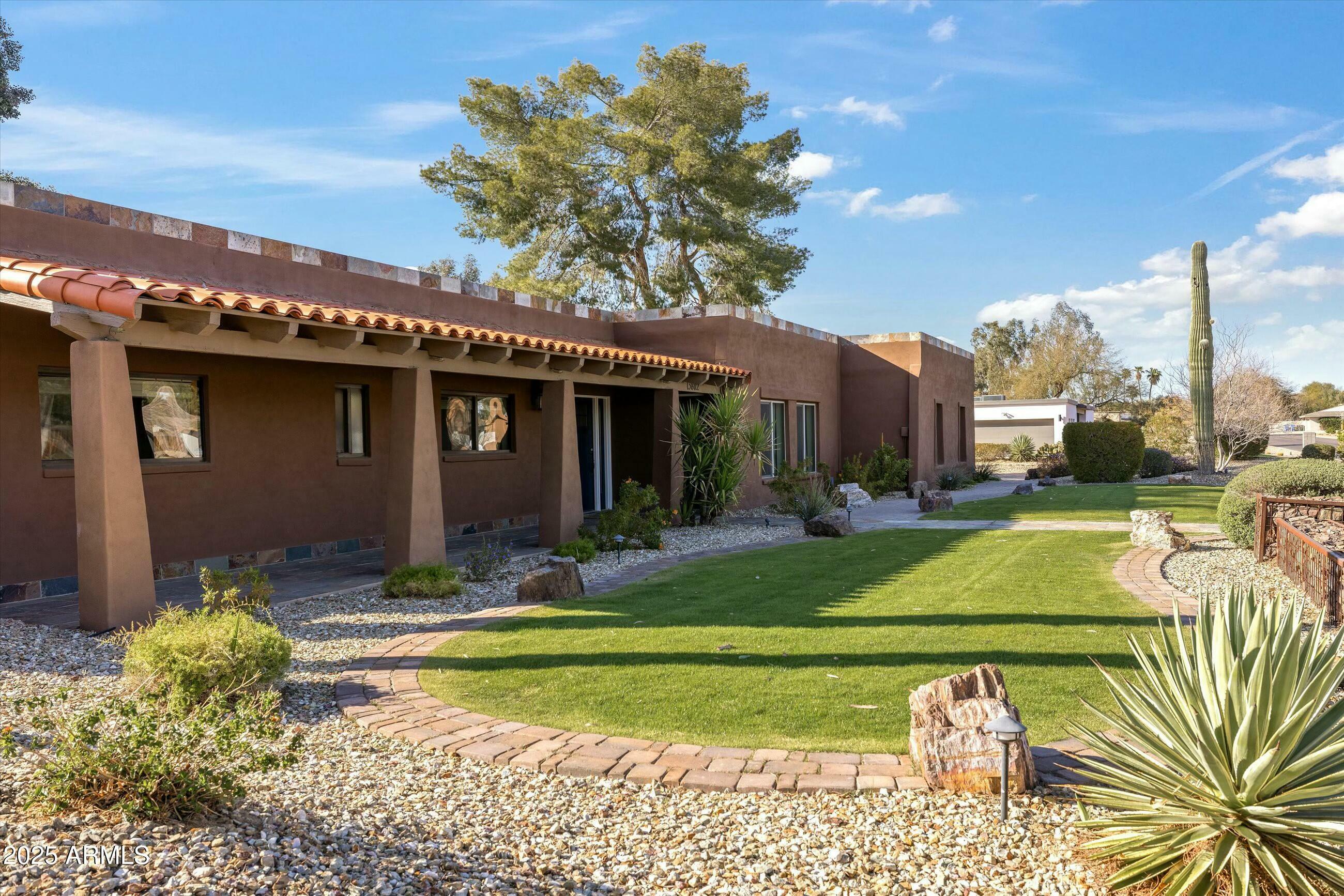 Property Photo: 13802 N 64th Place AZ 85254