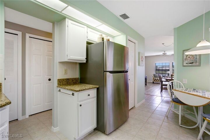 Property Photo: 13020 Amberley Court 306 FL 34135