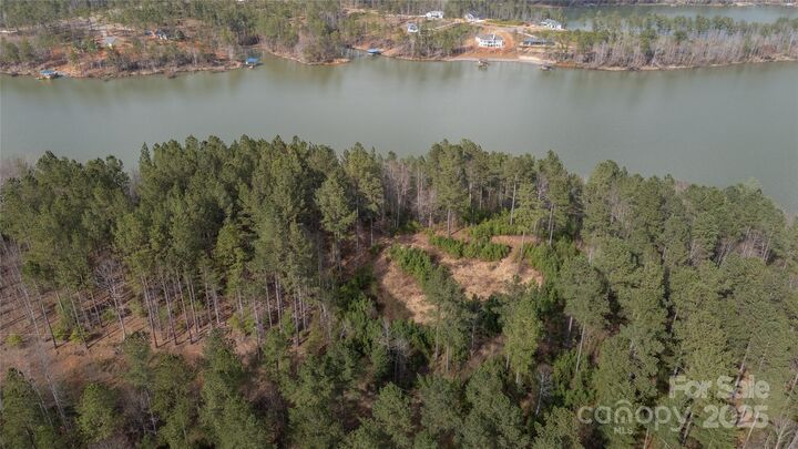Property Photo:  6355 McGalliard Pointe Drive NE 5  NC 28690 