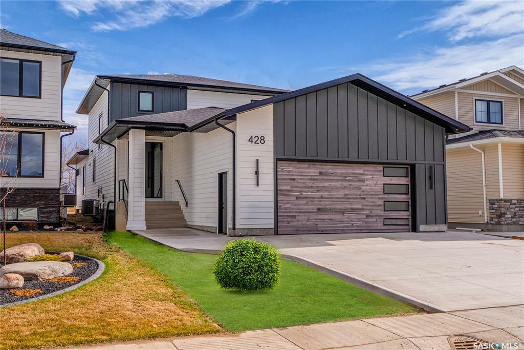 Property Photo: 428 Woolf Bend SK S7W 1E5