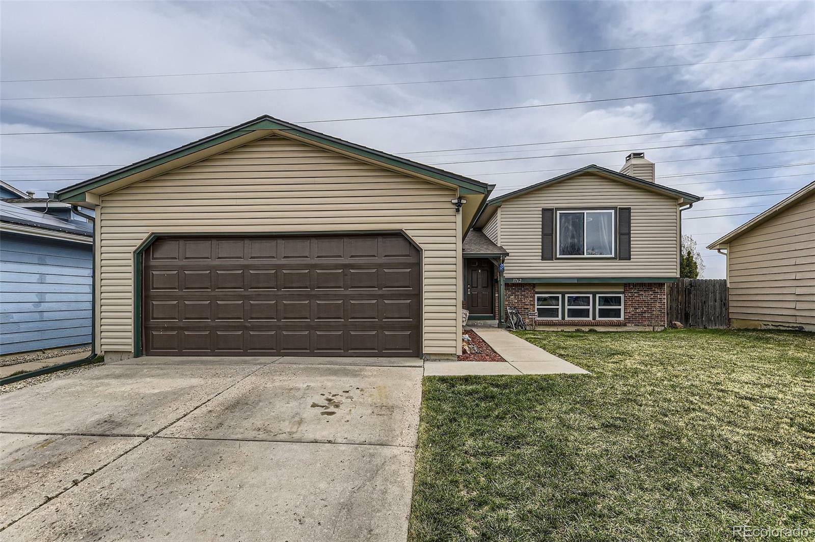 Property Photo: 3762 S Halifax Street CO 80013