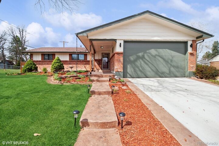 Property Photo: 7079 S Tamarac Court CO 80112