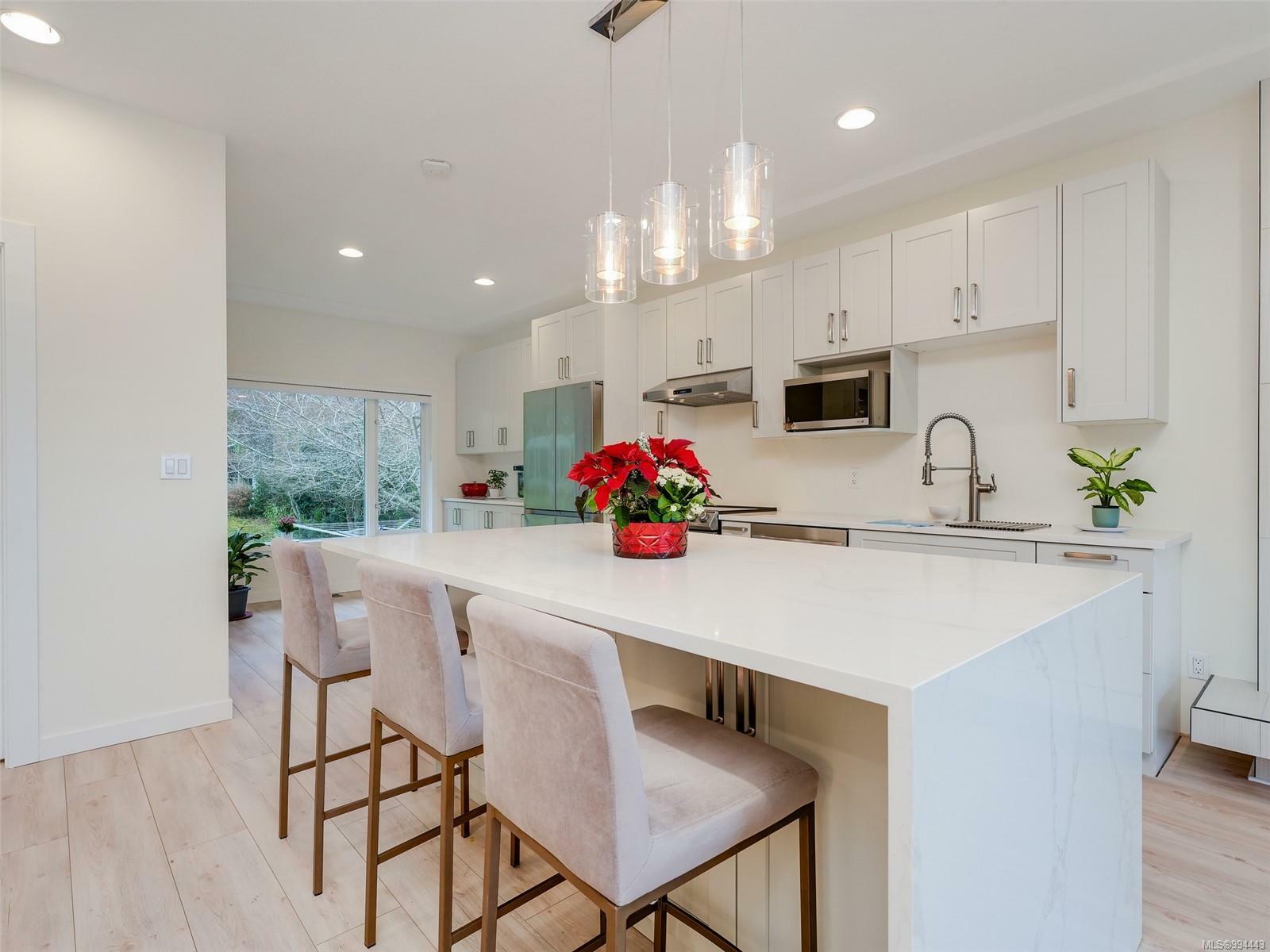 Property Photo: 4940 Cordova Bay Rd BC V8Y 2K2
