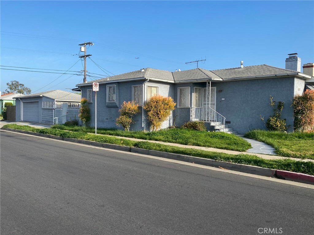 Property Photo: 8802 S Wilton Place CA 90047