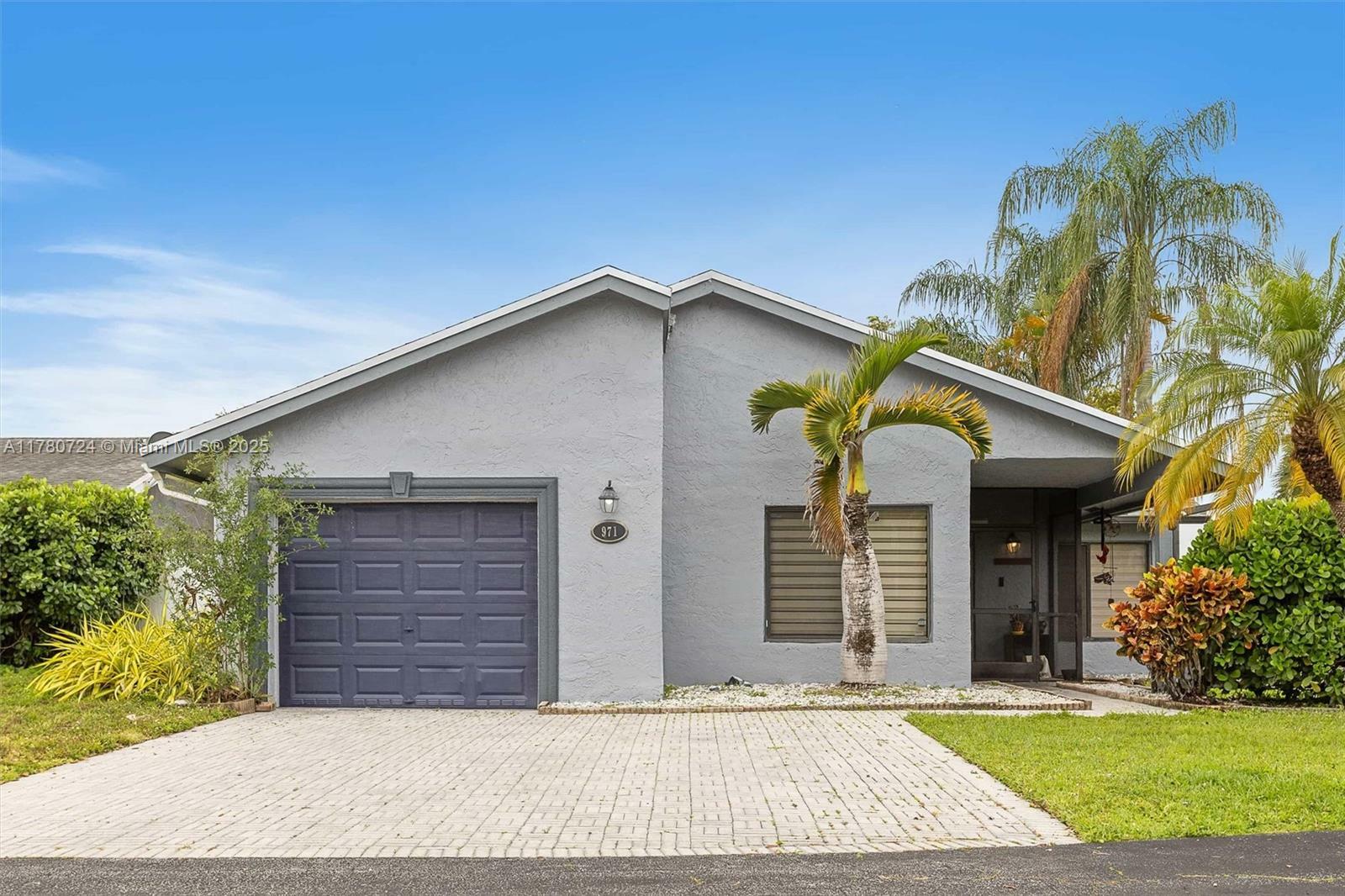Property Photo: 971 NW 89th Ave FL 33324