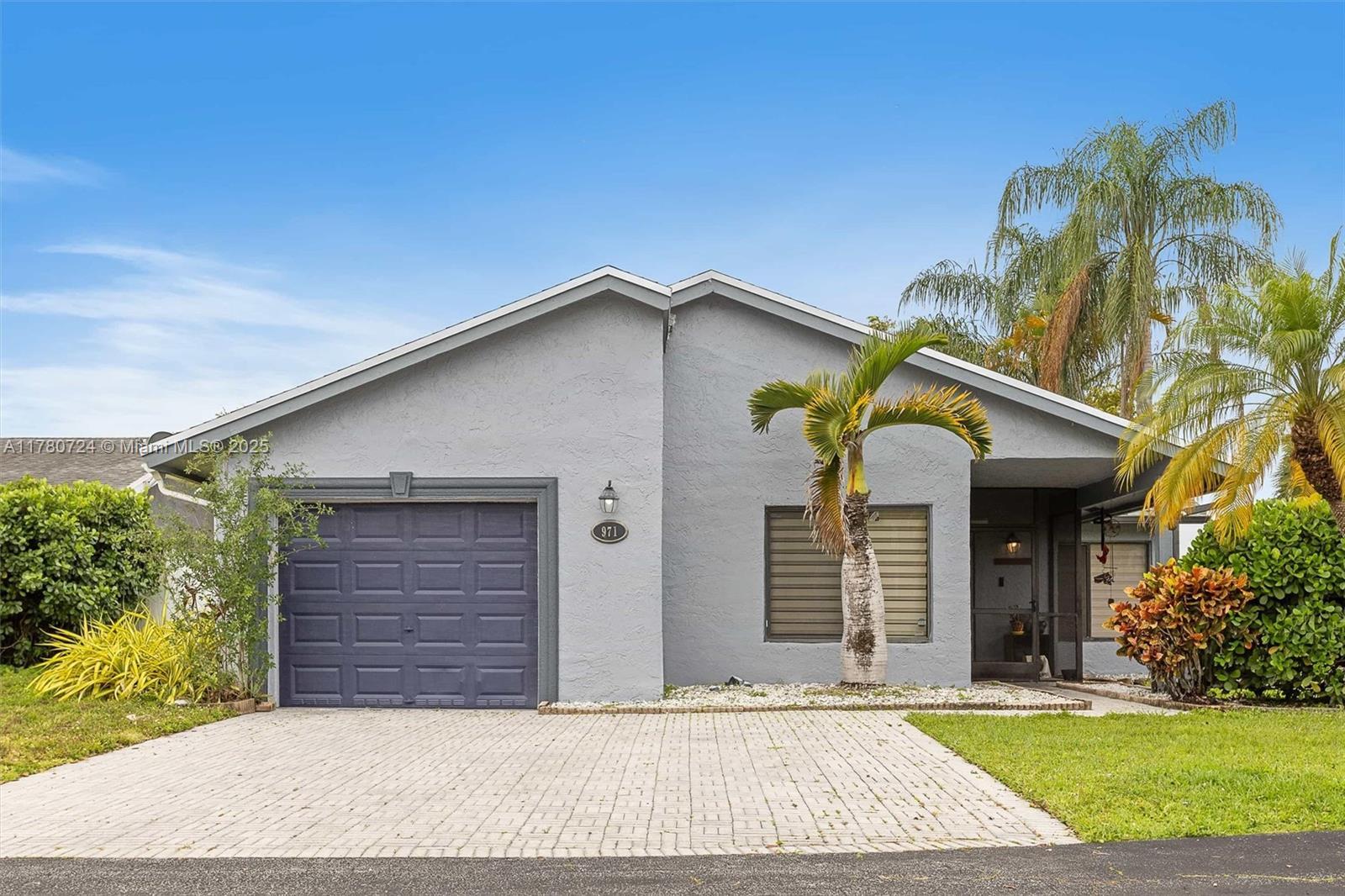 Property Photo: 971 NW 89th Ave FL 33324