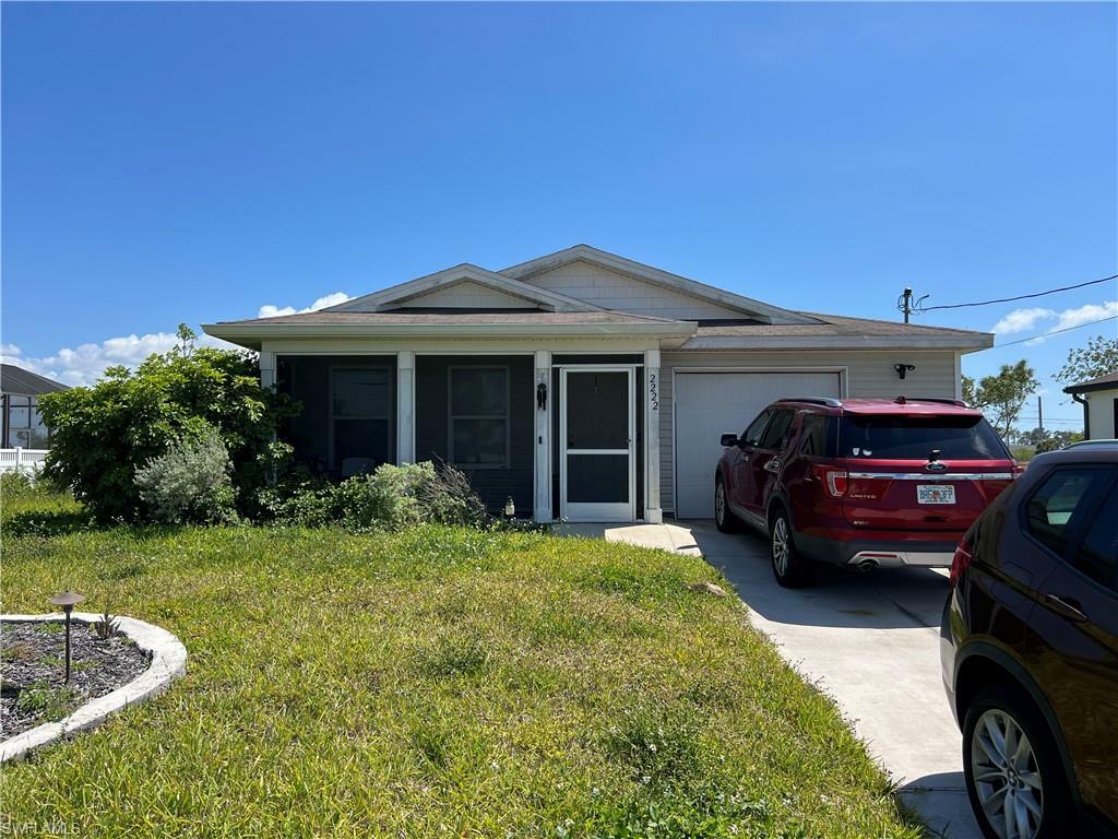 Property Photo: 2222 NW 25th Ln FL 33993