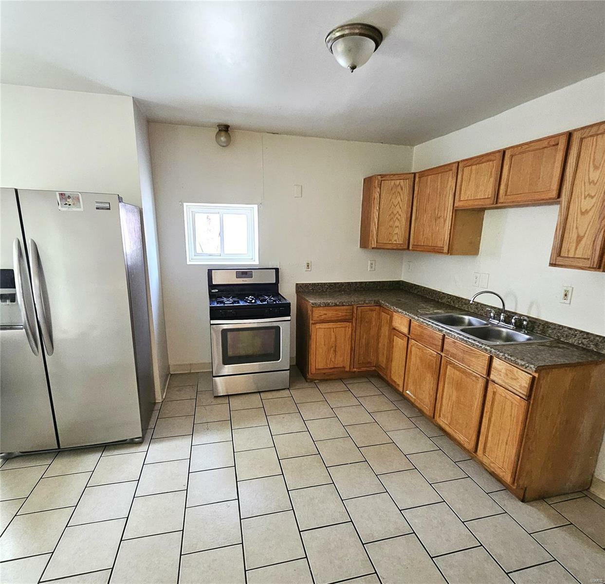Property Photo: 3825 S Grand Boulevard MO 63118