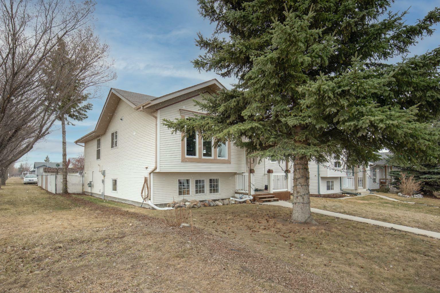 Property Photo: 5203 42 Street AB T4G 1K3
