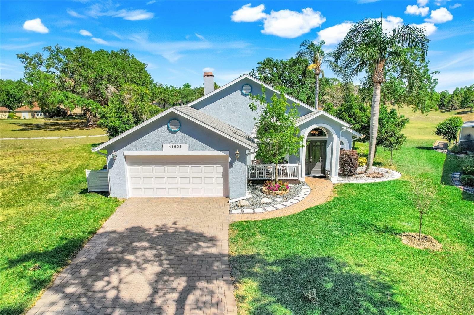 Property Photo: 16538 Rockwell Heights Ln FL 34711