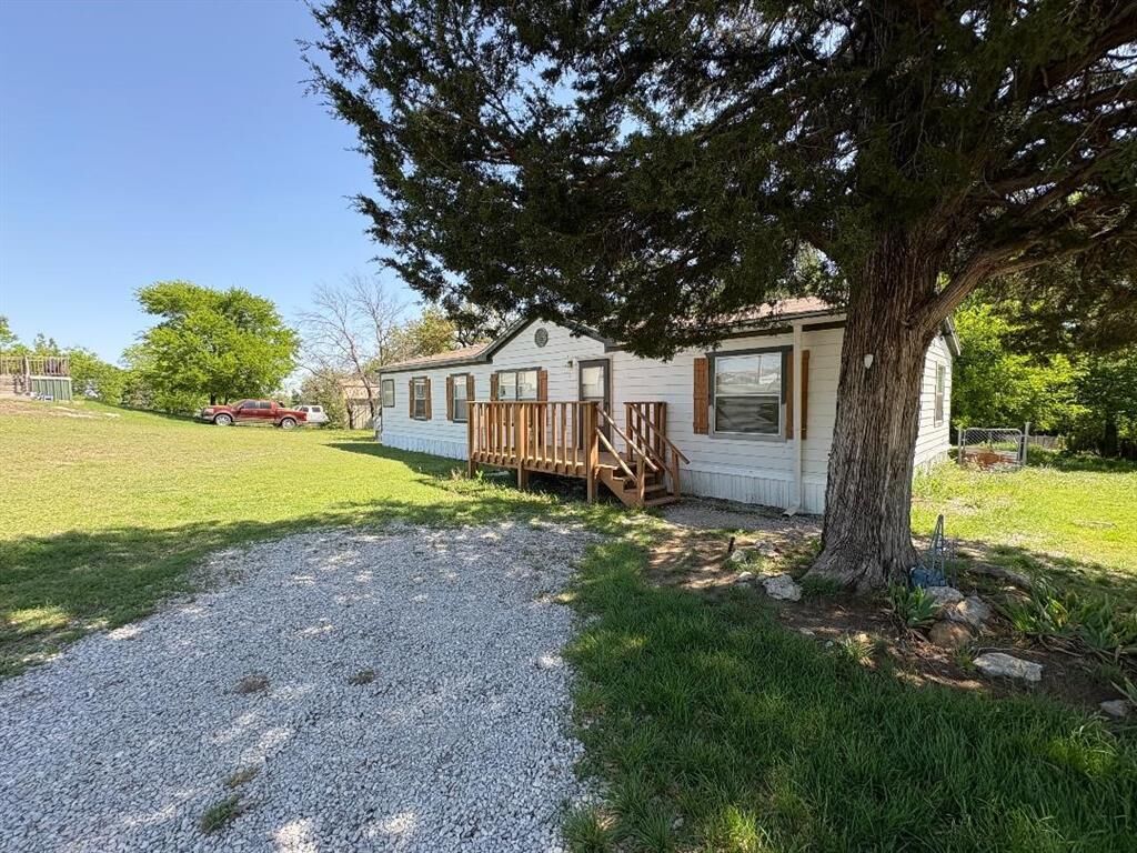 Photo de la propriété:  125 Classic Country Court  TX 76082