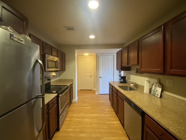 Property Photo: 20 Pond Street 204 MA 02184
